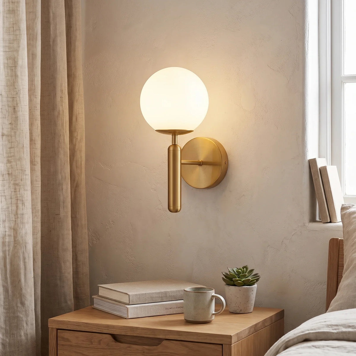 Sleek Modern Glass Globe Wall Sconce for Elegant Ambient Lighting