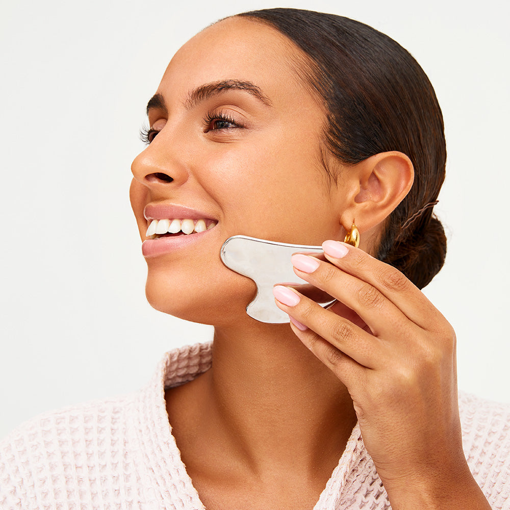 Stainless Steel Gua Sha Tool with Smooth Polished Surface and Travel Pouch for Daily Skincare Massage