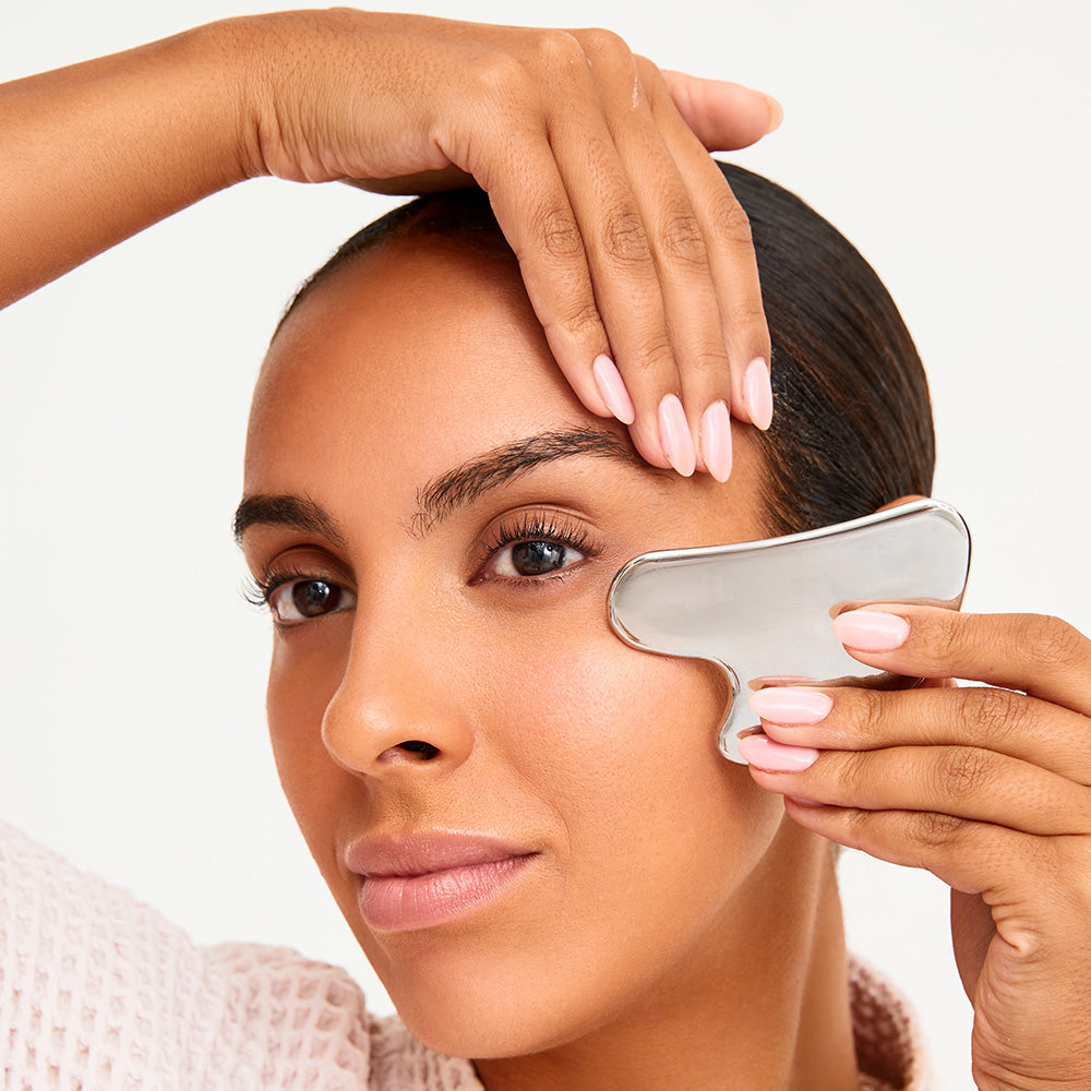 Stainless Steel Gua Sha Tool with Smooth Polished Surface and Travel Pouch for Daily Skincare Massage